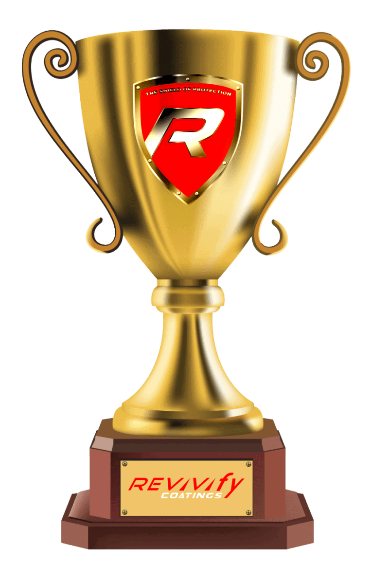 Golden trophy with a red and white "R" shield emblem on the upper part. The base features a plaque that reads "REVVify Coatings." The trophy has elegant, curved handles on either side.