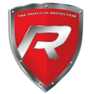 A red and silver shield logo with a bold "R" in the center. The top of the shield reads "THE SHIELD OF PROTECTION." The Die-cut Decal - Shield of Protection features a metallic border with rivet details around the edges.