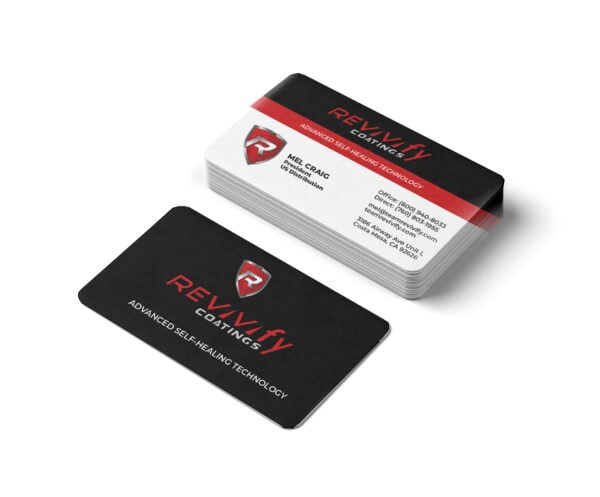 A stack of Team REVIVIfy Business Cards on a white background. The top card displays contact information for Mel Craig alongside the Revivify Coatings logo and slogan, "Advanced Self-Healing Technology," proudly showcasing the innovation of Team REVIVIfy.