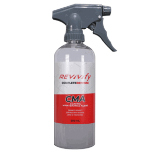 A gray spray bottle labeled "Revivify CMA COMPLETEDEFENSE COATING MAINTENANCE AGENT" with a red band around the middle. The bottle contains 500 ml of liquid and is designed for enhancing and maintaining protective coatings.