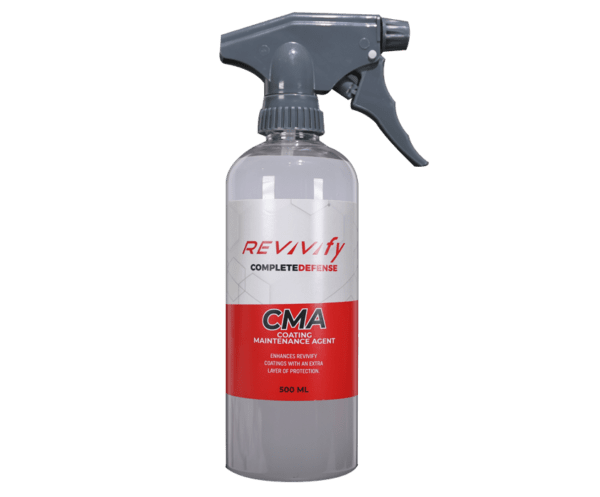 A gray spray bottle labeled "Revivify CMA COMPLETEDEFENSE COATING MAINTENANCE AGENT" with a red band around the middle. The bottle contains 500 ml of liquid and is designed for enhancing and maintaining protective coatings.