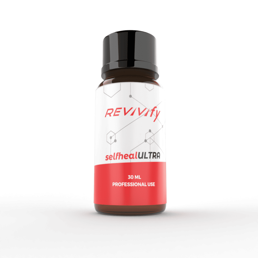 A small bottle labeled "REVVify" with "selfheal ULTRA" written below. The bottle has a red and white design, holds 30 ml, and is intended for professional home use. The black-capped bottle features a hexagonal pattern background on the label.