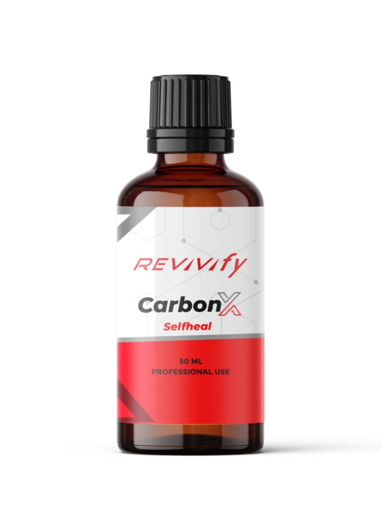 A 50ml bottle of Revivify CarbonX Selfheal, part of the esteemed Revivify Product Line, designed for professional use. The bottle is dark with a black cap and features a white and red label adorned with geometric patterns and text indicating the product name and specifications.